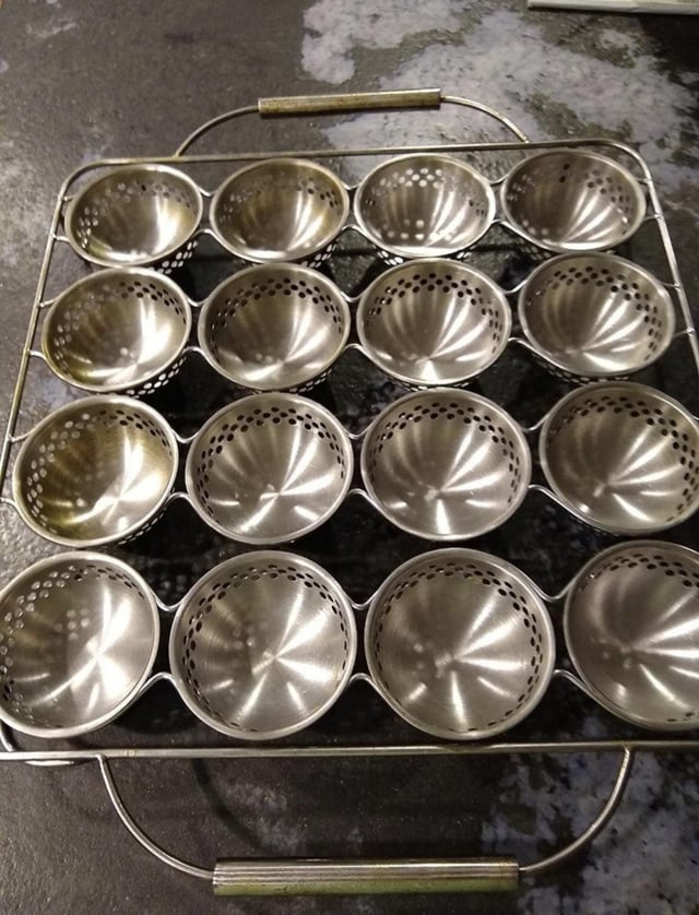 r/whatisthisthing - a metal tray with holes in it